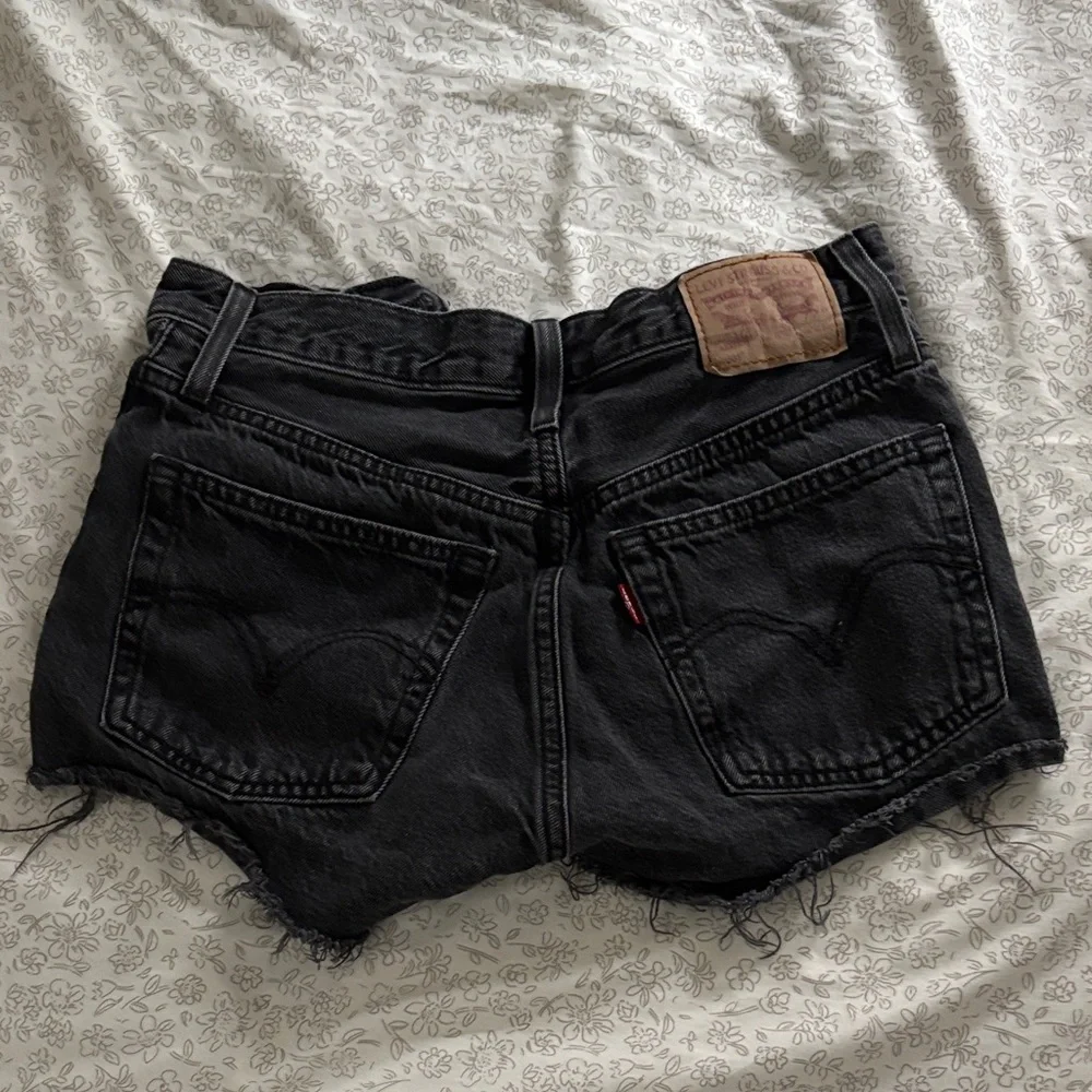 Levi's Black High-Rise Distressed Denim Shorts - Picture 2 of 4